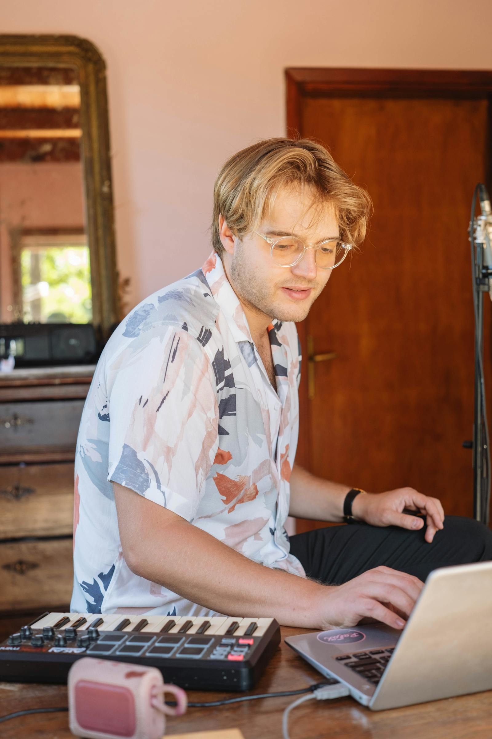 Planning notes and guitar representing band coordination work